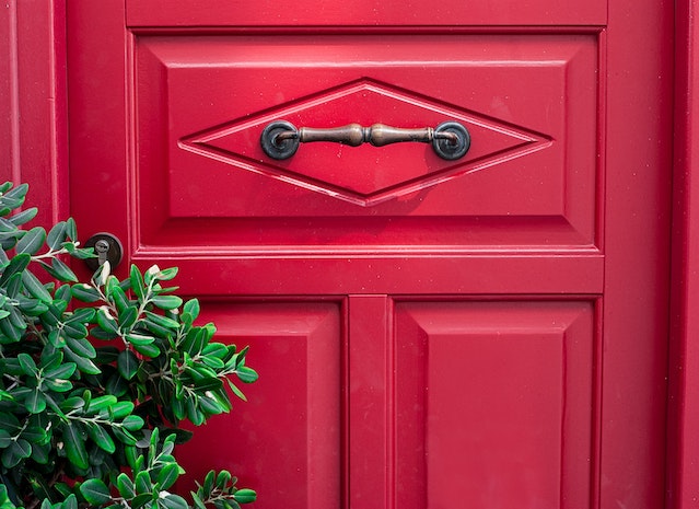 Close-up of a red composite door